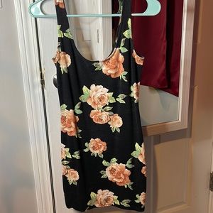 Floral print dress from Forever 21. 95% cotton. 5% spandex/elastane.